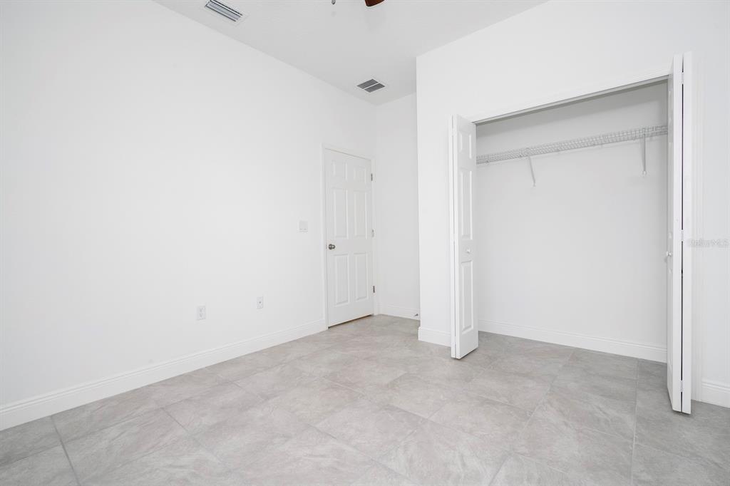 1533 West Diamond Road Citrus Springs, FL 34434 - Photo 53 of 66 an empty room with closet area