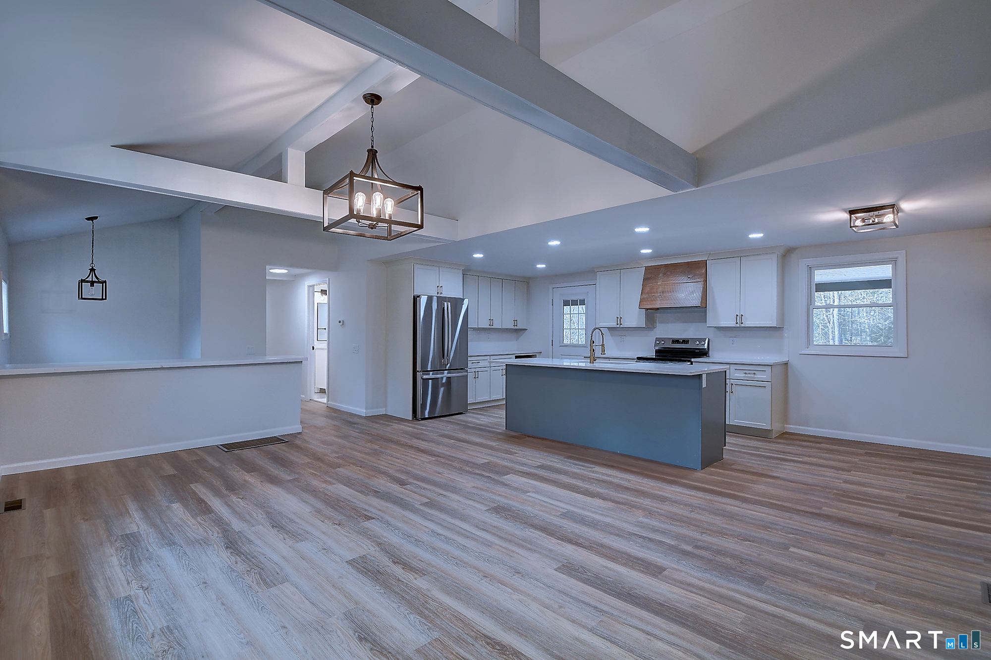 24 Dunay Road Stafford, CT 06076 - Photo 12 of 38 a view of kitchen with granite countertop cabinets and wooden floor
