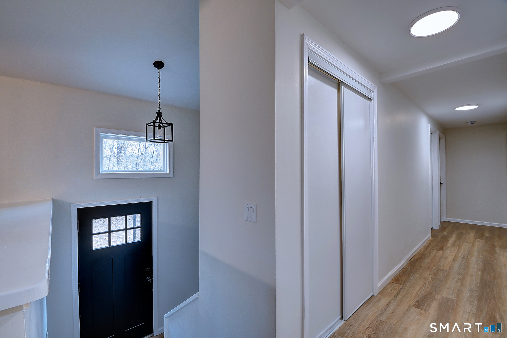24 Dunay Road Stafford, CT 06076 - Photo 19 of 38 a view of a hallway with windows