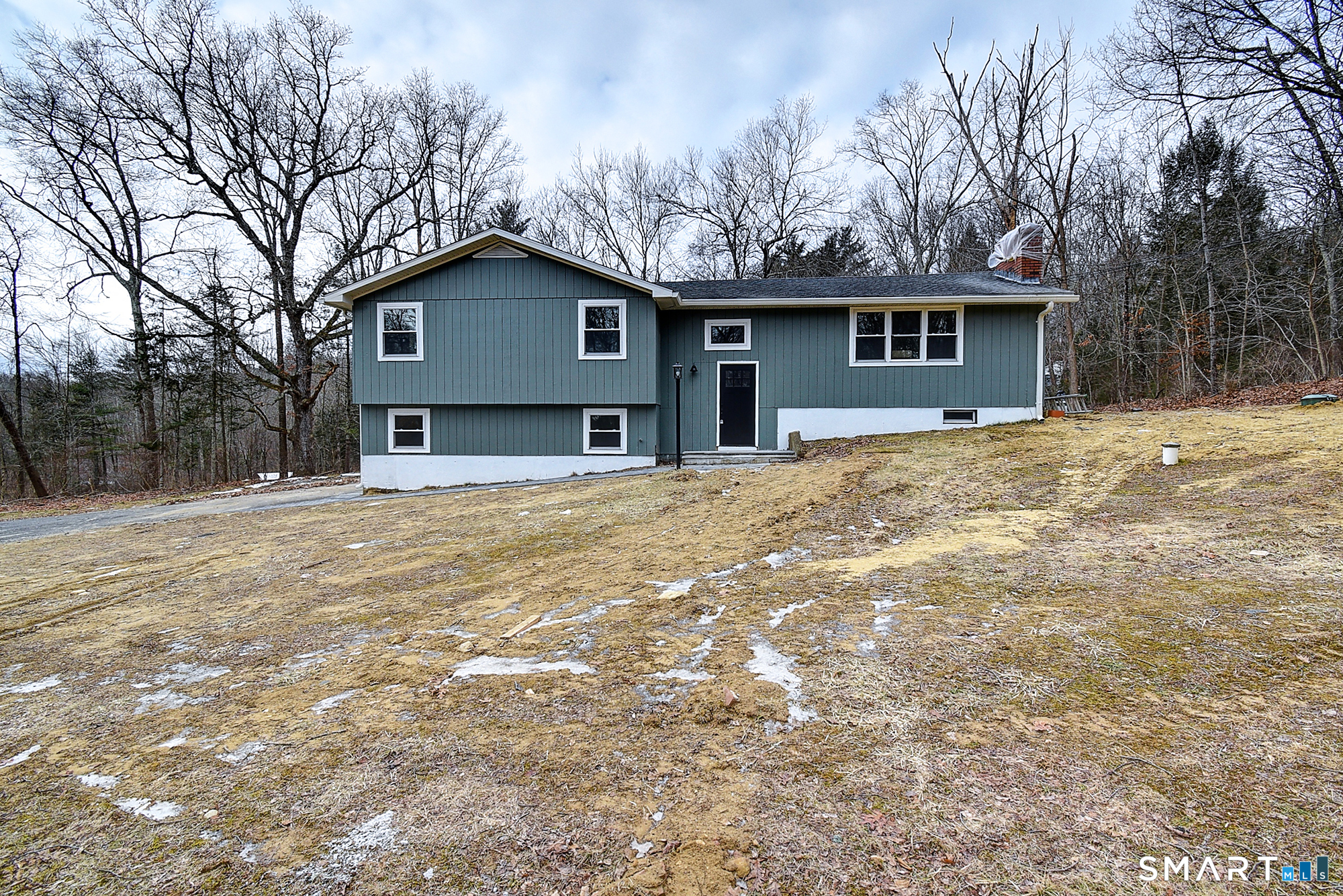 24 Dunay Road Stafford Springs, CT 06076 - Photo 2 of 38 a house with trees in the background