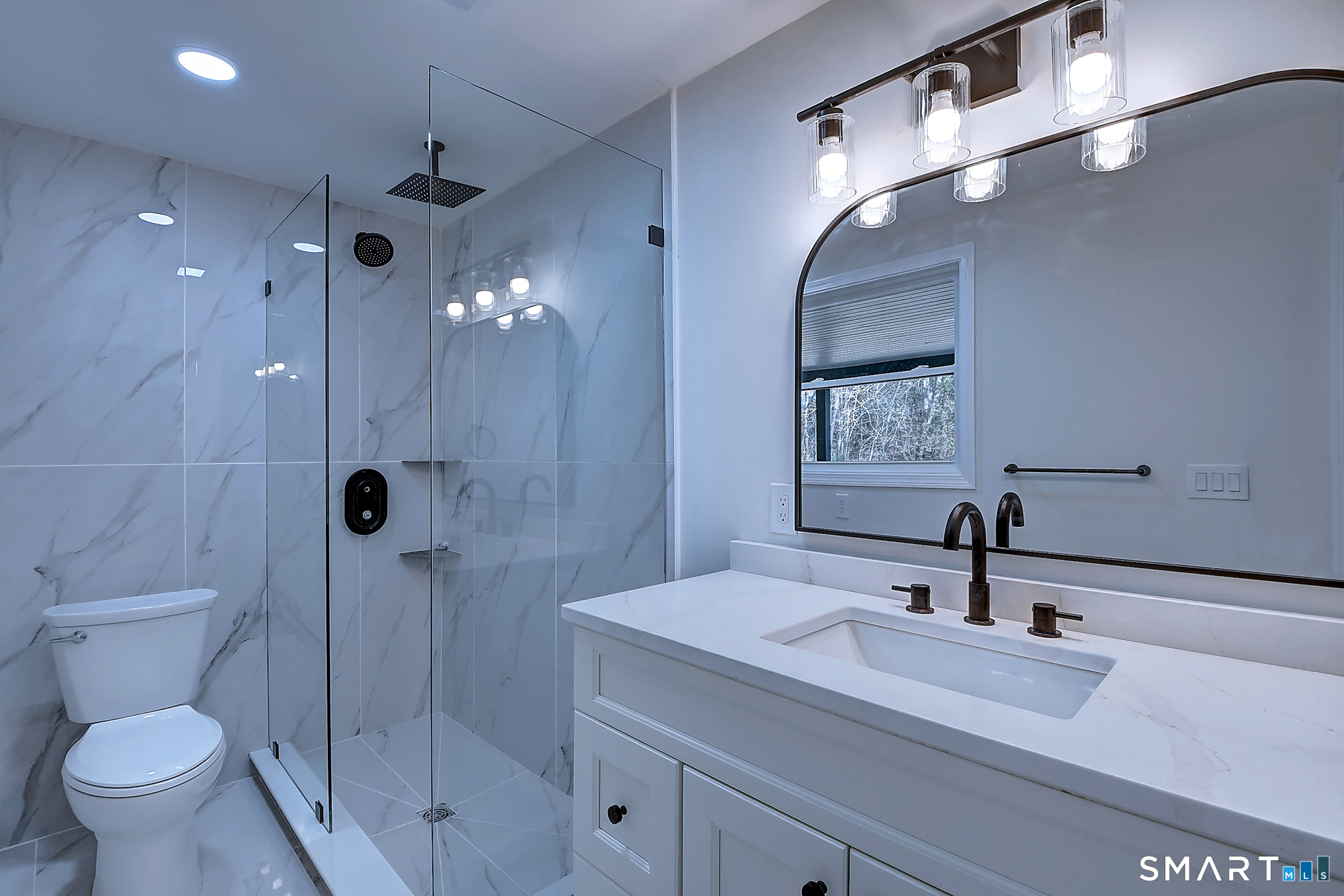 24 Dunay Road Stafford Springs, CT 06076 - Photo 3 of 38 a bathroom with a sink a toilet and shower