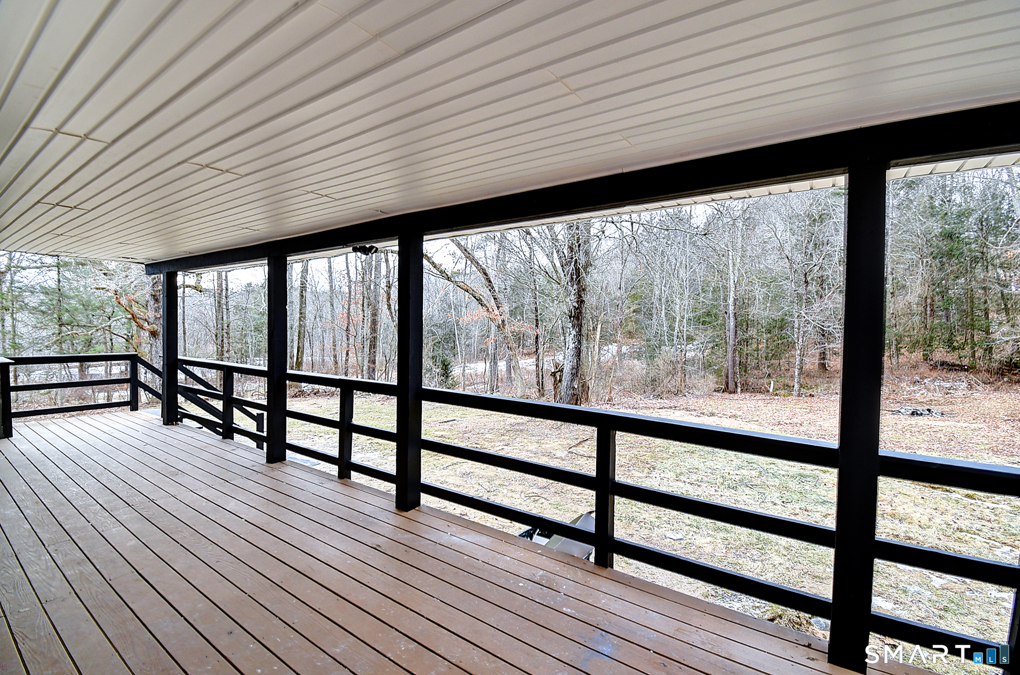 24 Dunay Road Stafford Springs, CT 06076 - Photo 36 of 38 a view of a room with wooden floor and outdoor seating