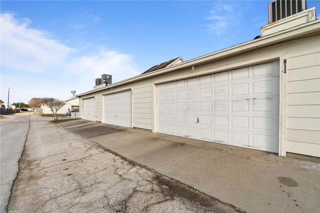 3025 Quail Springs Road, Unit B11 Corpus Christi, TX 78414 - Photo 20 of 20 a view of a backyard of garage