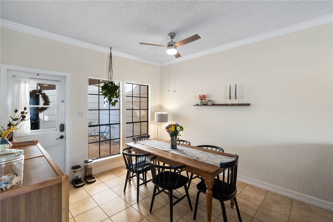 3025 Quail Springs Road, Unit B11 Corpus Christi, TX 78414 - Photo 5 of 20 a view of a workspace with furniture and wooden floor