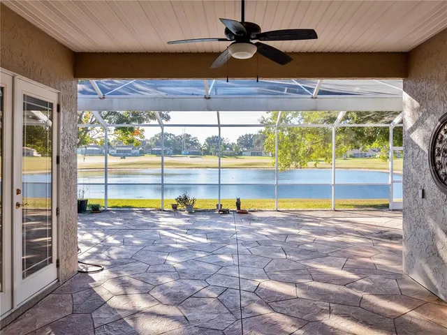 a view of a swimming pool with a balcony