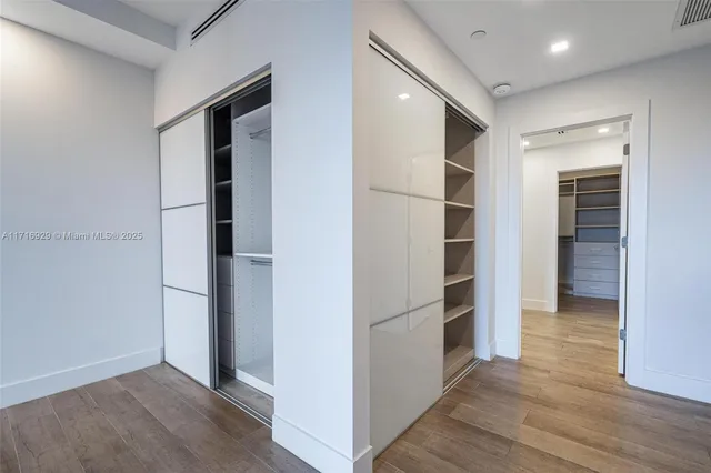 a bathroom with a double vanity sink and mirror