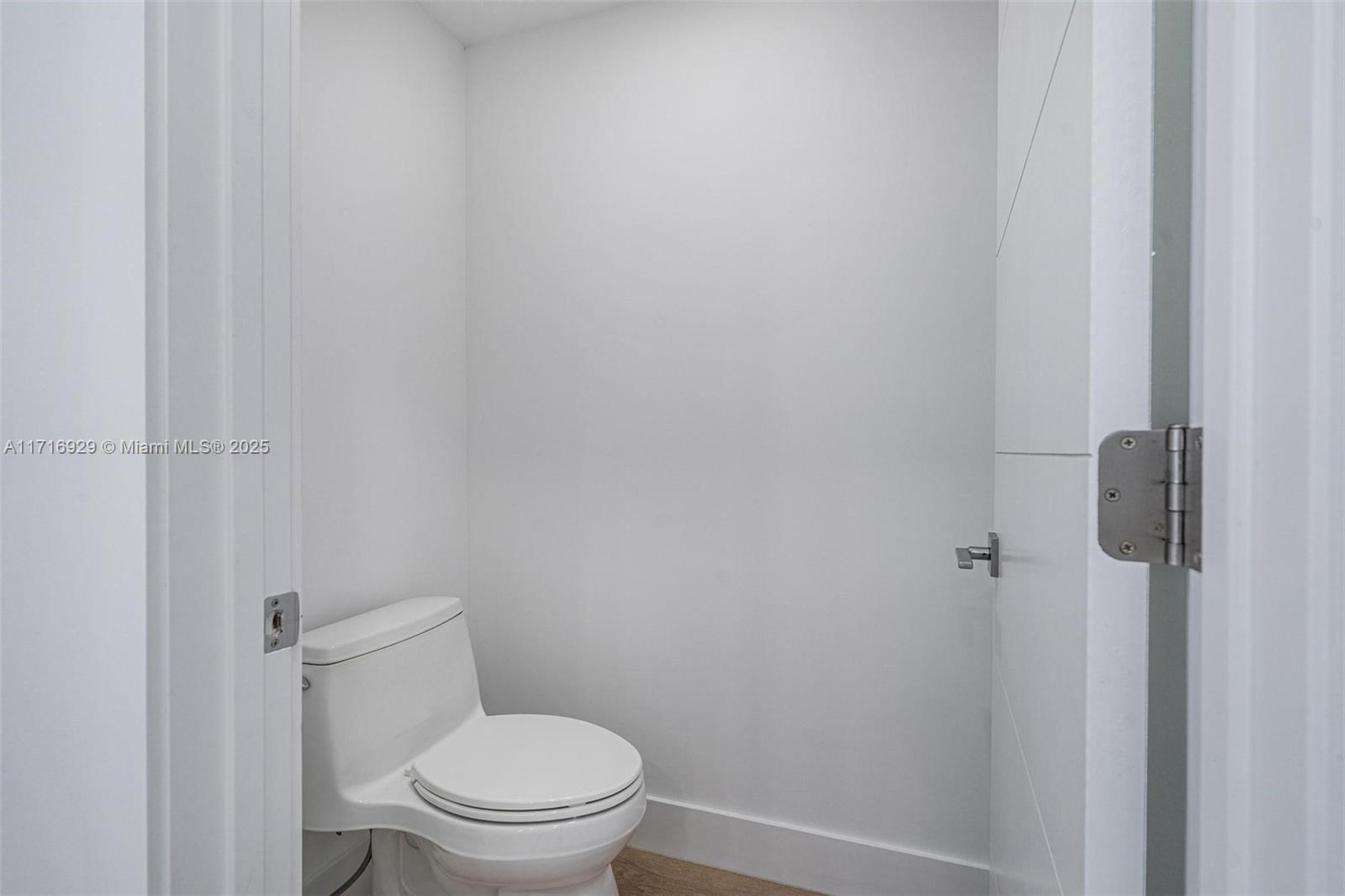 151 Crandon Boulevard, Unit 534 Key Biscayne, FL 33149 - Photo 23 of 49 a white toilet sitting next to a shower