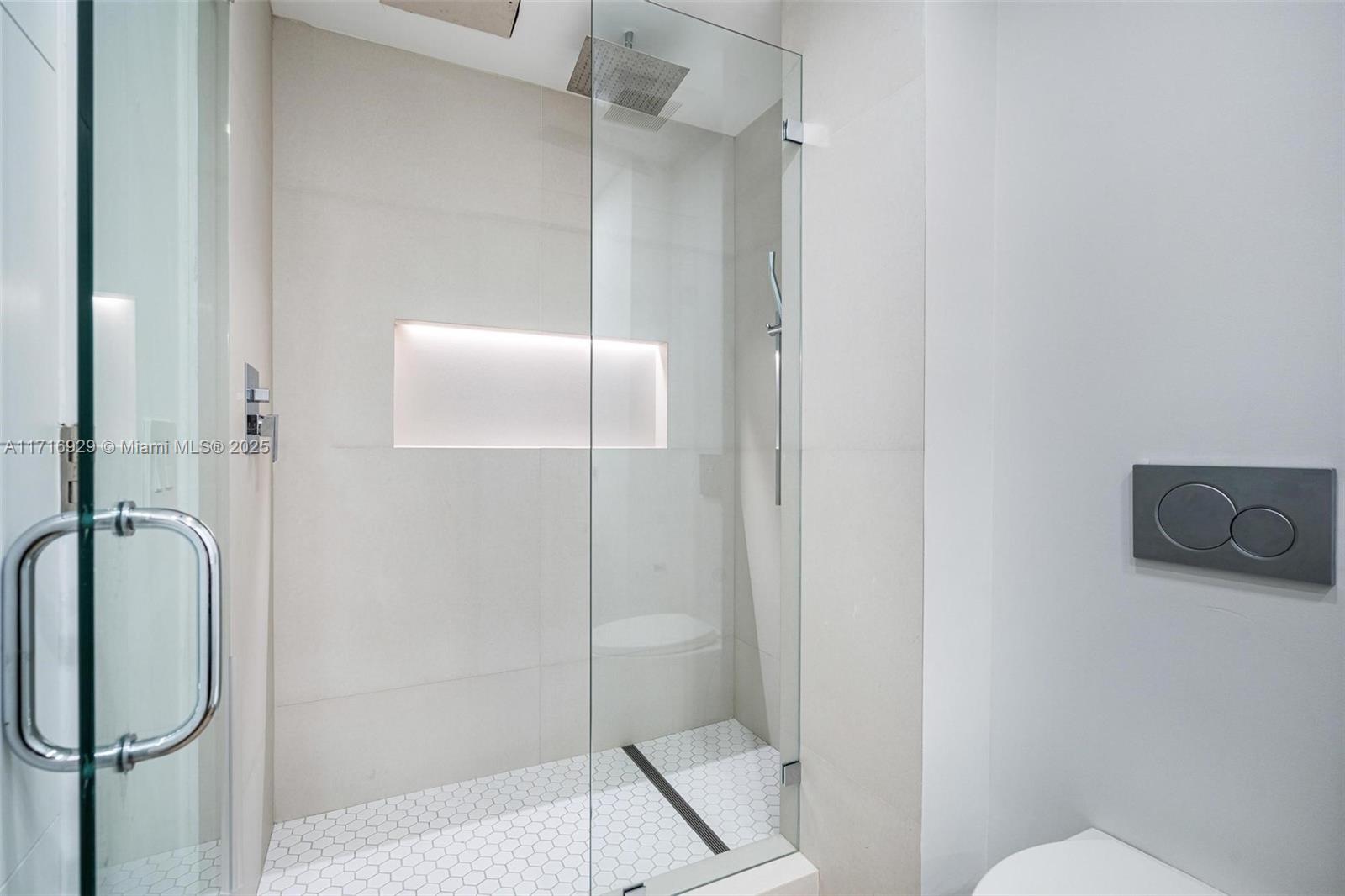 151 Crandon Boulevard, Unit 534 Key Biscayne, FL 33149 - Photo 25 of 49 a bathroom with a shower