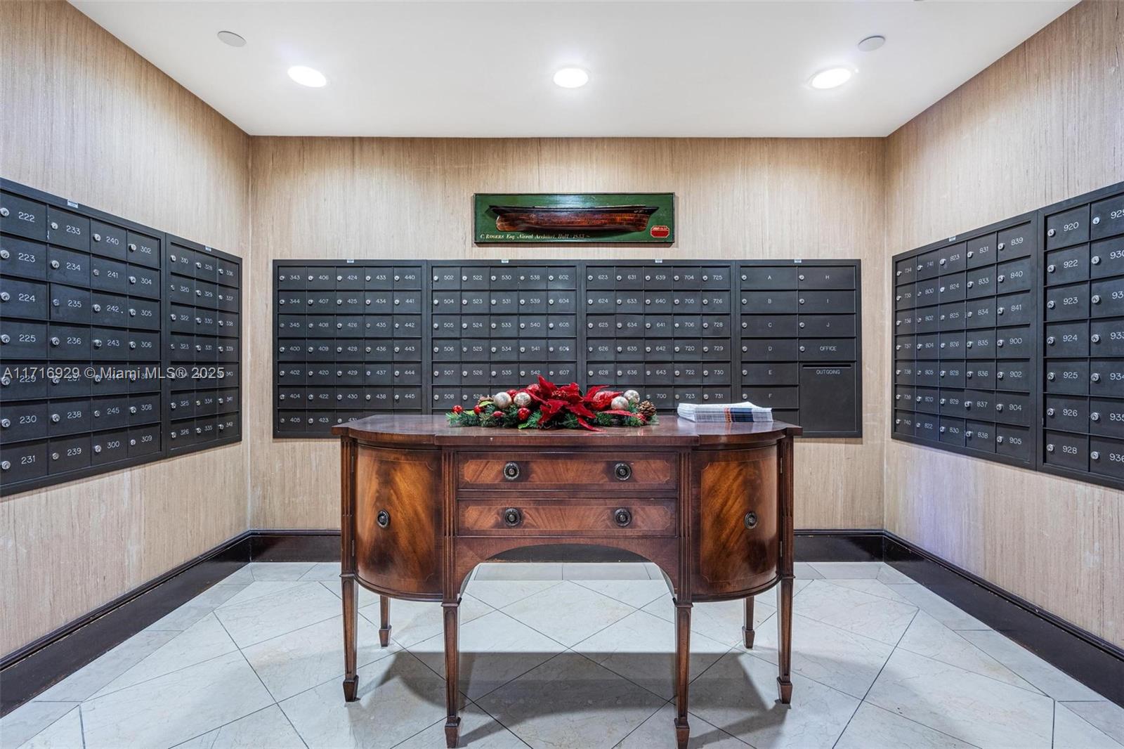 151 Crandon Boulevard, Unit 534 Key Biscayne, FL 33149 - Photo 34 of 49 a kitchen with stainless steel appliances kitchen island granite countertop a sink and a stove