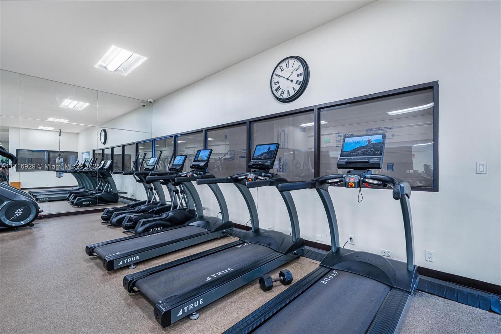 151 Crandon Boulevard, Unit 534 Key Biscayne, FL 33149 - Photo 37 of 49 a view of a room with gym equipment