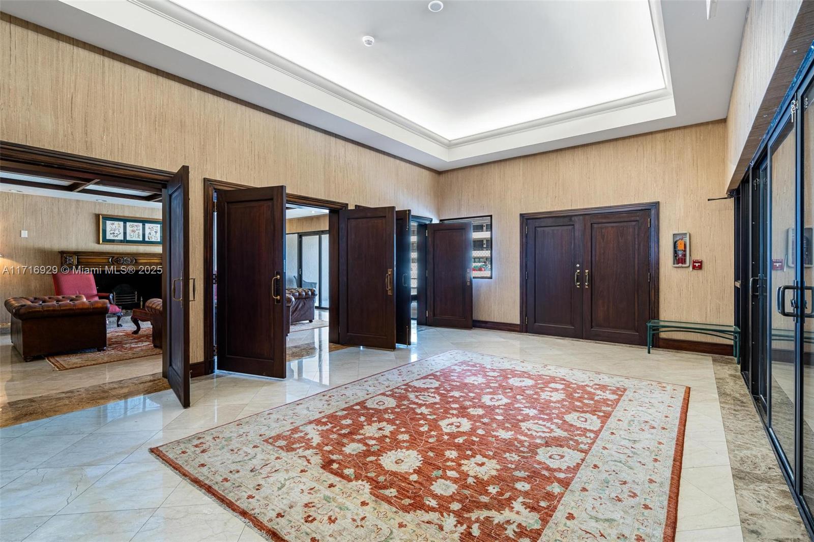 151 Crandon Boulevard, Unit 534 Key Biscayne, FL 33149 - Photo 40 of 49 a view of a hallway with a couch and dining room view