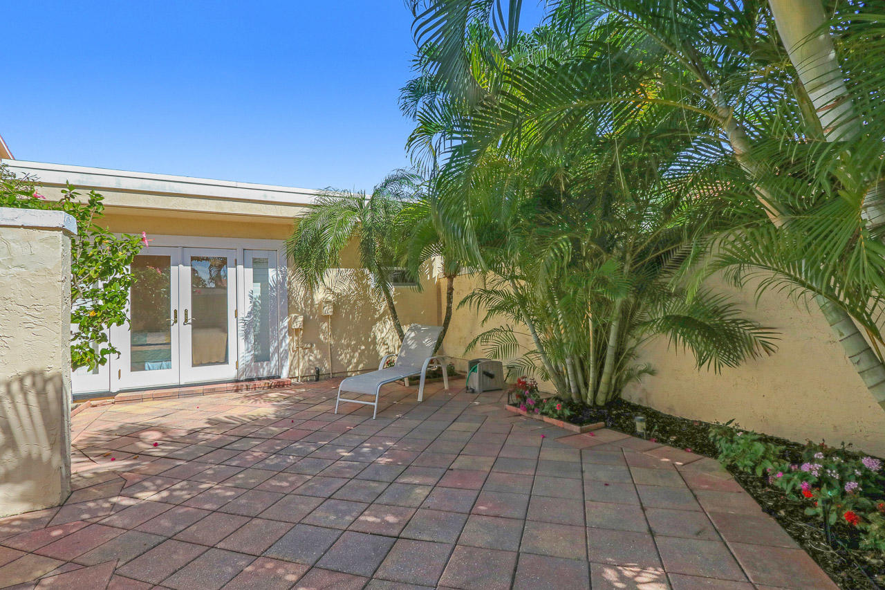 112 Bluefish Circle Jupiter, FL 33477 - Photo 20 of 28 Patio off first floor guest room
