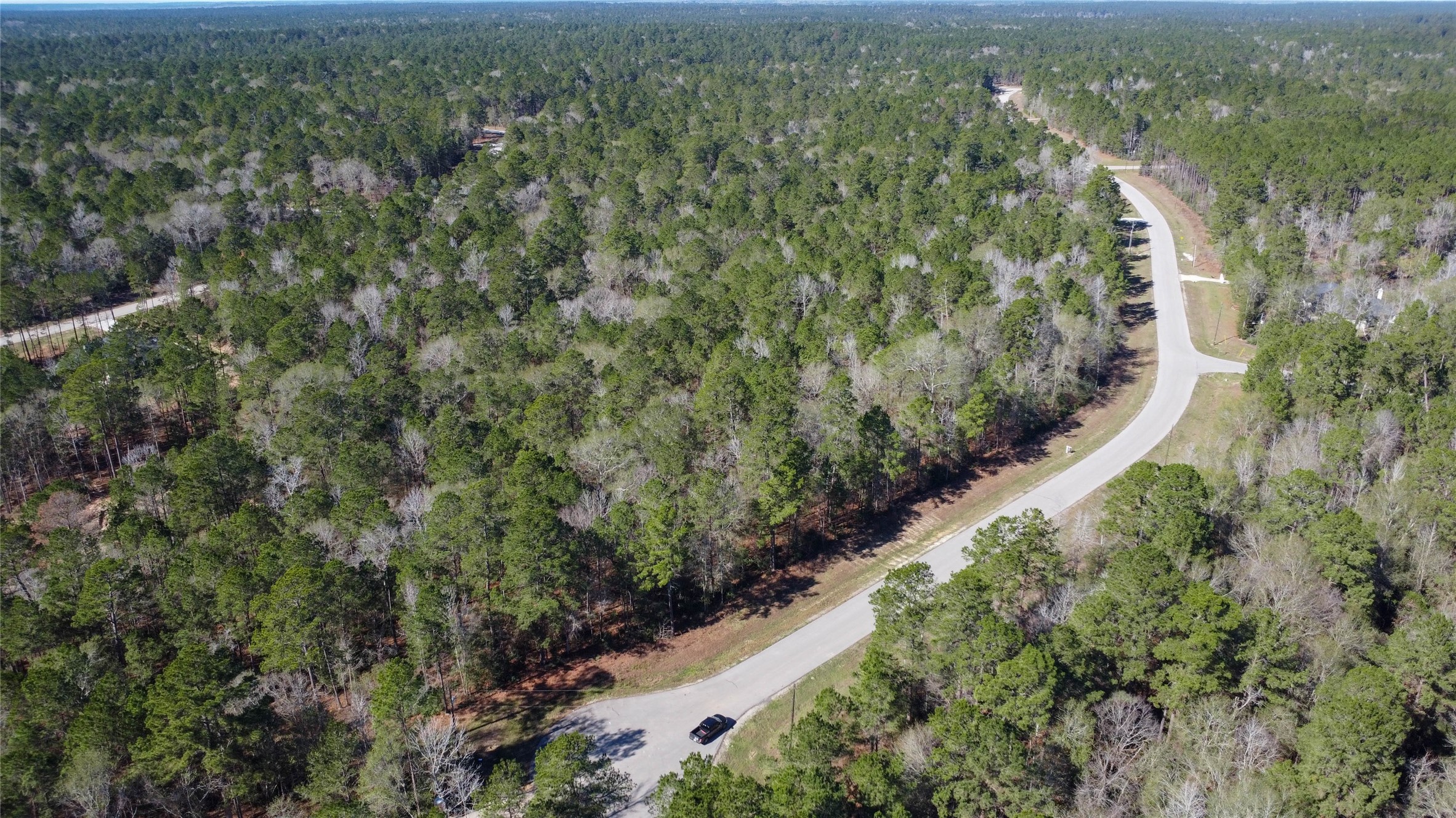 0 Bighorn Road Huntsville, TX 77340 - Photo 11 of 22 an aerial view of residential house with outdoor space and trees all around