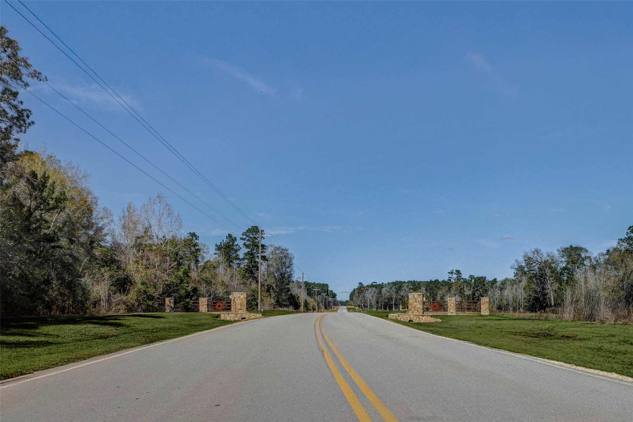0 Bighorn Road Huntsville, TX 77340 - Photo 7 of 22 a view of a road with a building in the background