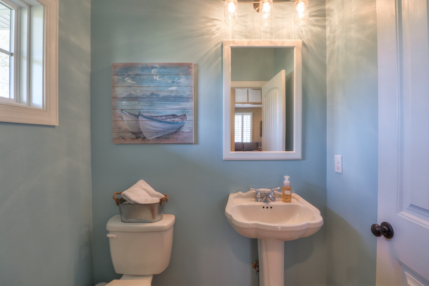 4275 Cairo Bend Road Lebanon, TN 37087 - Photo 15 of 41 a bathroom with a toilet sink and mirror