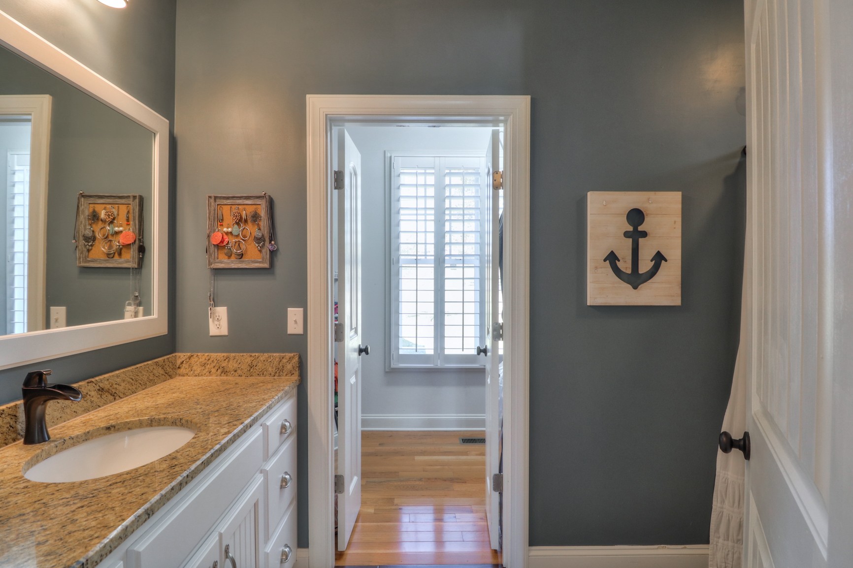 4275 Cairo Bend Road Lebanon, TN 37087 - Photo 20 of 41 a bathroom with a granite countertop sink a mirror and a shower