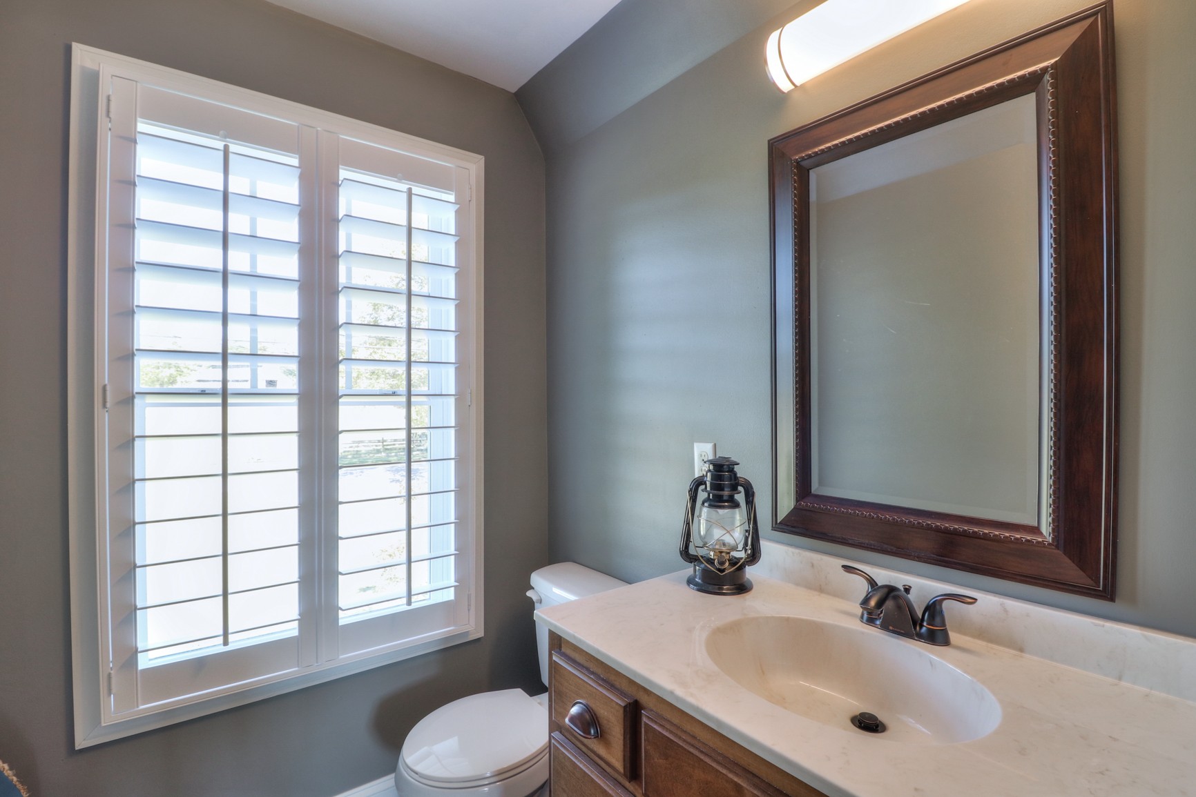4275 Cairo Bend Road Lebanon, TN 37087 - Photo 26 of 41 a bathroom with a sink vanity and a mirror