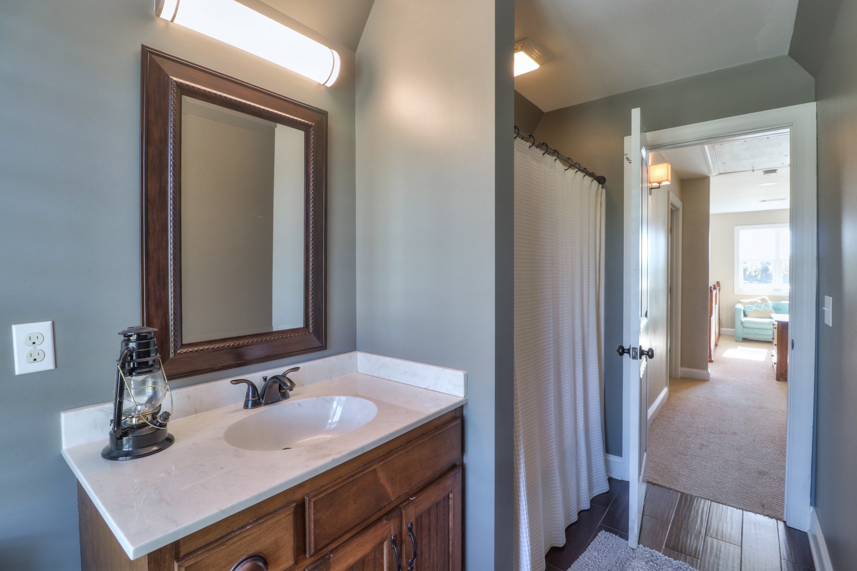 4275 Cairo Bend Road Lebanon, TN 37087 - Photo 27 of 41 a bathroom with a sink and a mirror
