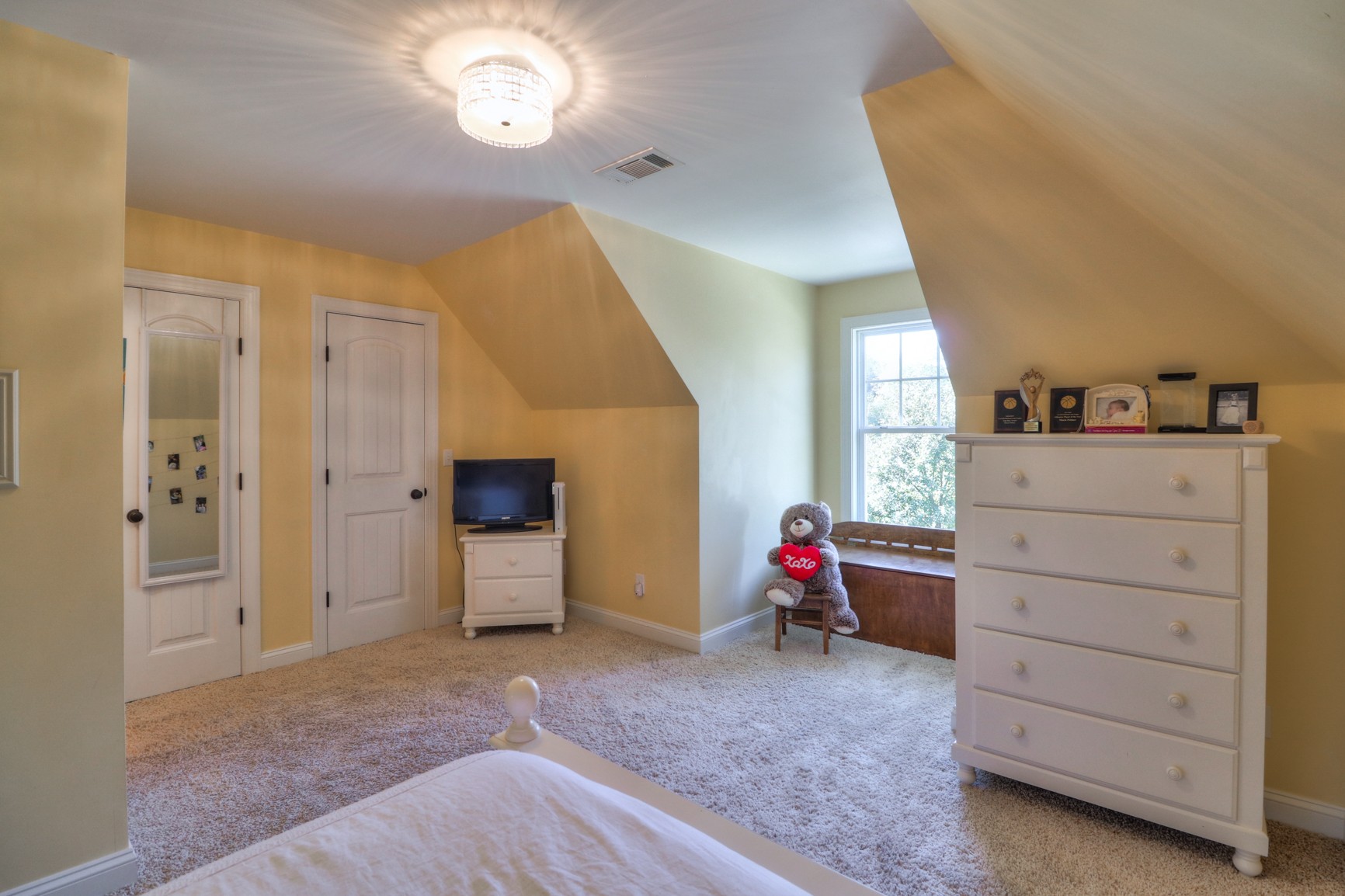 4275 Cairo Bend Road Lebanon, TN 37087 - Photo 30 of 41 a view of a bedroom with closet cabinet and window
