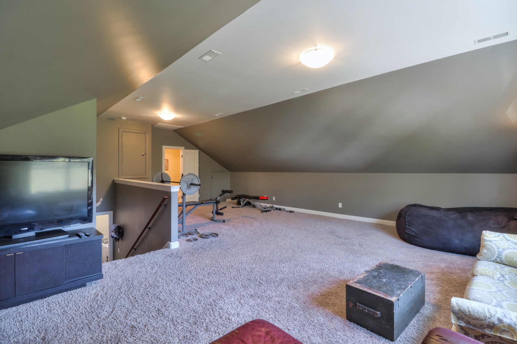 4275 Cairo Bend Road Lebanon, TN 37087 - Photo 34 of 41 a living room with furniture and a flat screen tv