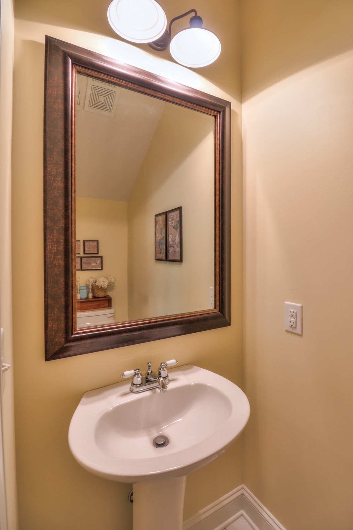 4275 Cairo Bend Road Lebanon, TN 37087 - Photo 35 of 41 a bathroom with a sink and a mirror