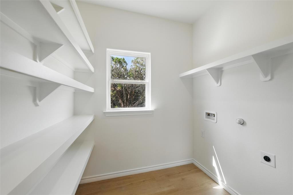 112 Cedar Shadow Lane Whitney, TX 76692 - Photo 13 of 28 a view of an empty room with a window
