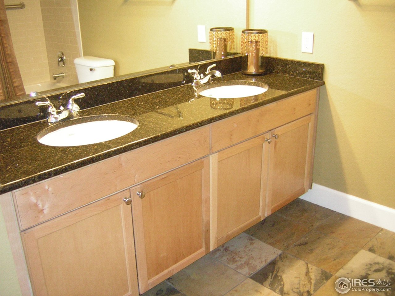 4500 Baseline Road, Unit 2207 Boulder, CO 80303 - Photo 12 of 16 a bathroom with a sink and a mirror