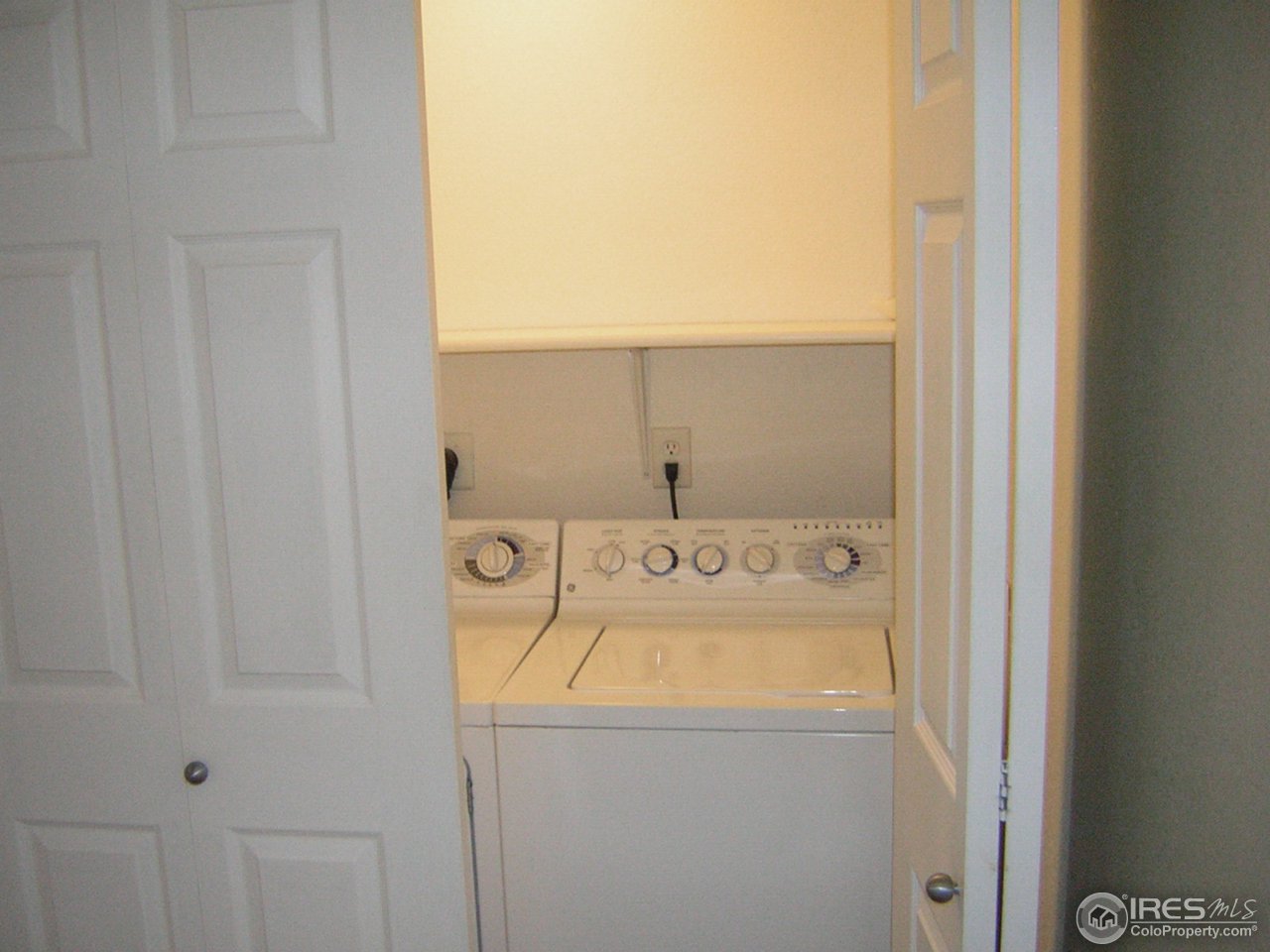 4500 Baseline Road, Unit 2207 Boulder, CO 80303 - Photo 13 of 16 a utility room with dryer and washer