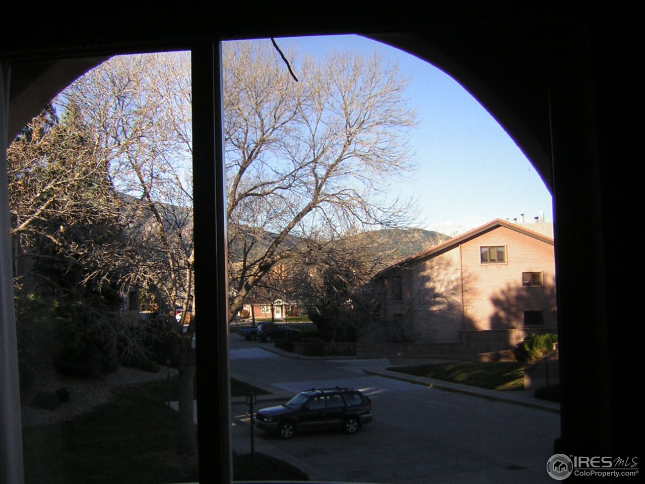 4500 Baseline Road, Unit 2207 Boulder, CO 80303 - Photo 15 of 16 a view of a small yard from a balcony