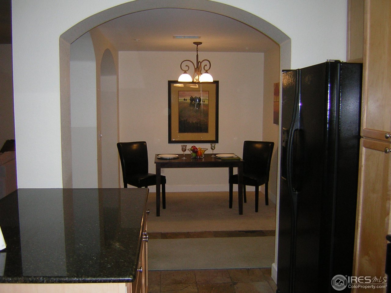 4500 Baseline Road, Unit 2207 Boulder, CO 80303 - Photo 7 of 16 a view of a livingroom with furniture and wooden floor