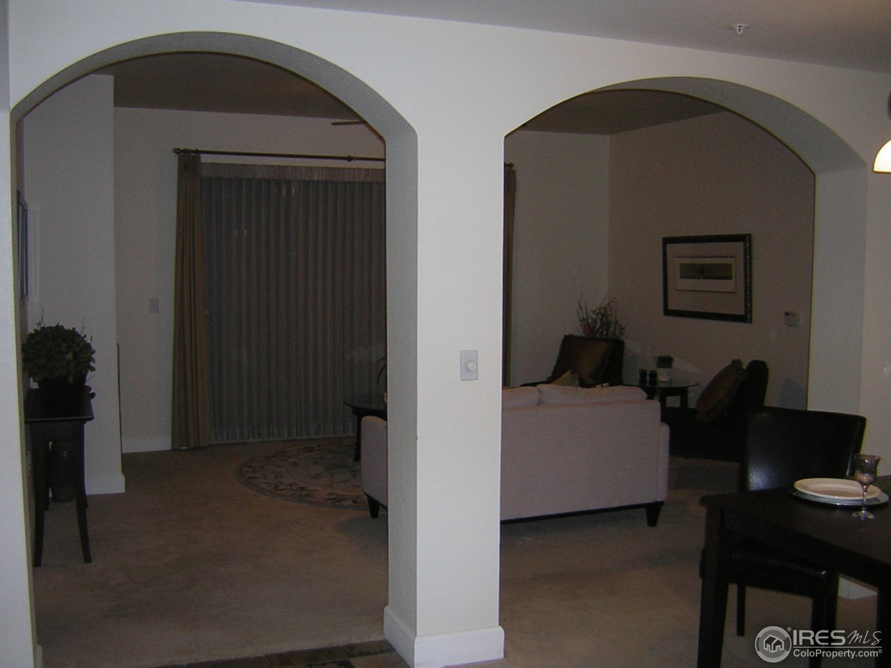 4500 Baseline Road, Unit 2207 Boulder, CO 80303 - Photo 9 of 16 a living room with furniture and a window