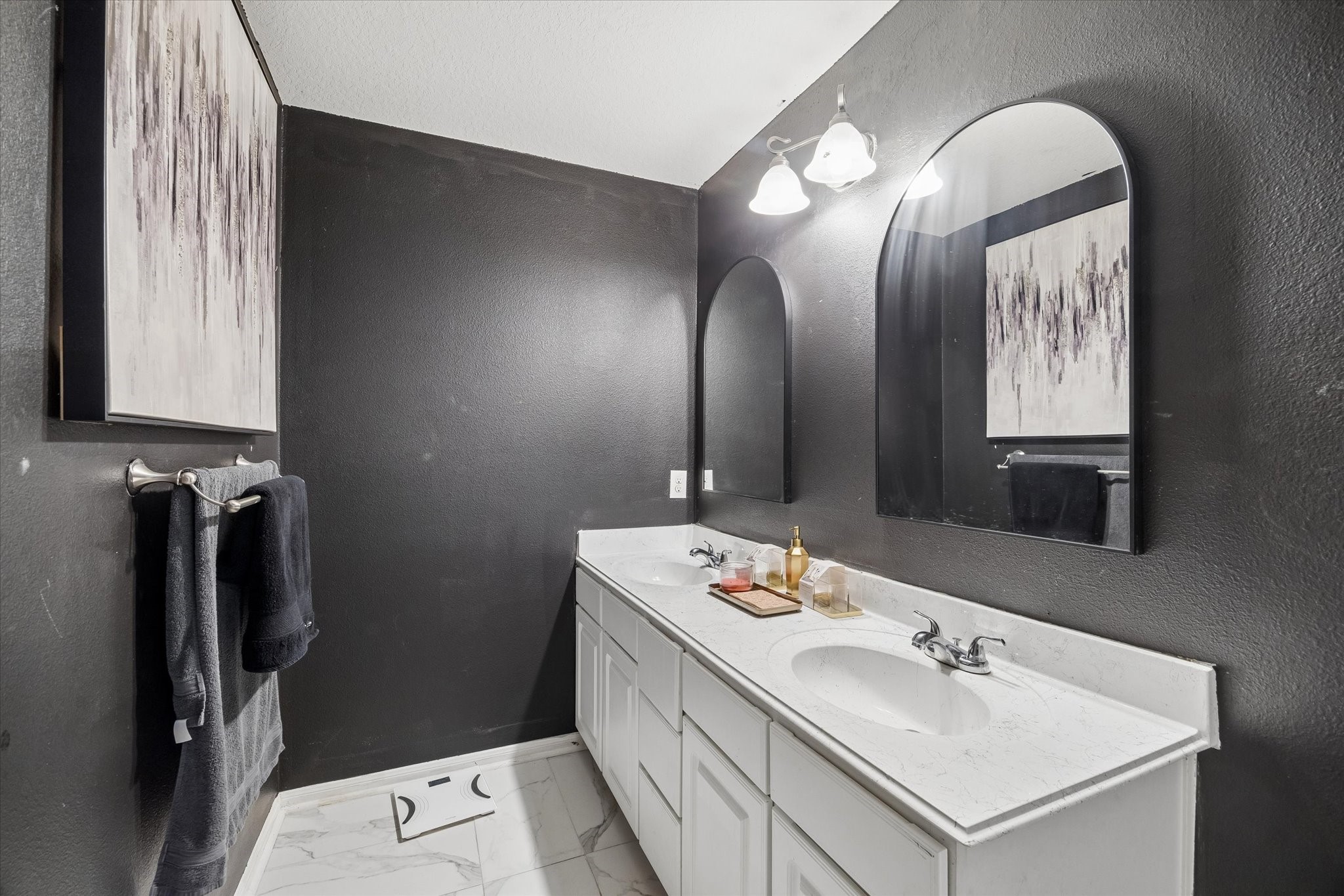 4830 Conifer Ridge Way Humble, TX 77346 - Photo 11 of 16 a bathroom with a sink and a mirror