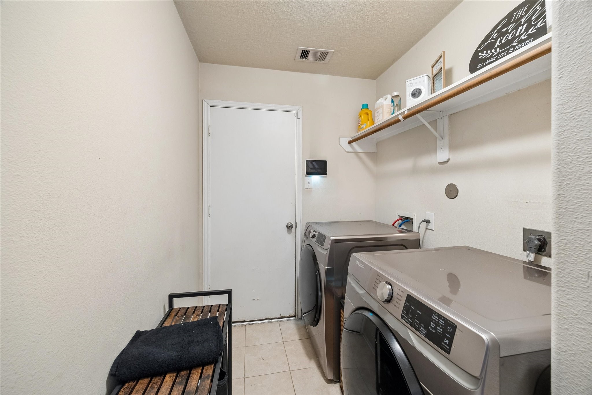 4830 Conifer Ridge Way Humble, TX 77346 - Photo 14 of 16 a utility room with dryer and washer
