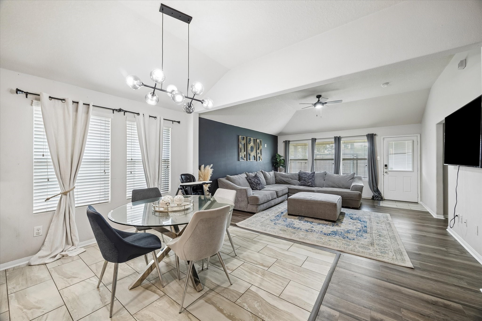 4830 Conifer Ridge Way Humble, TX 77346 - Photo 2 of 16 a living room with furniture and a flat screen tv