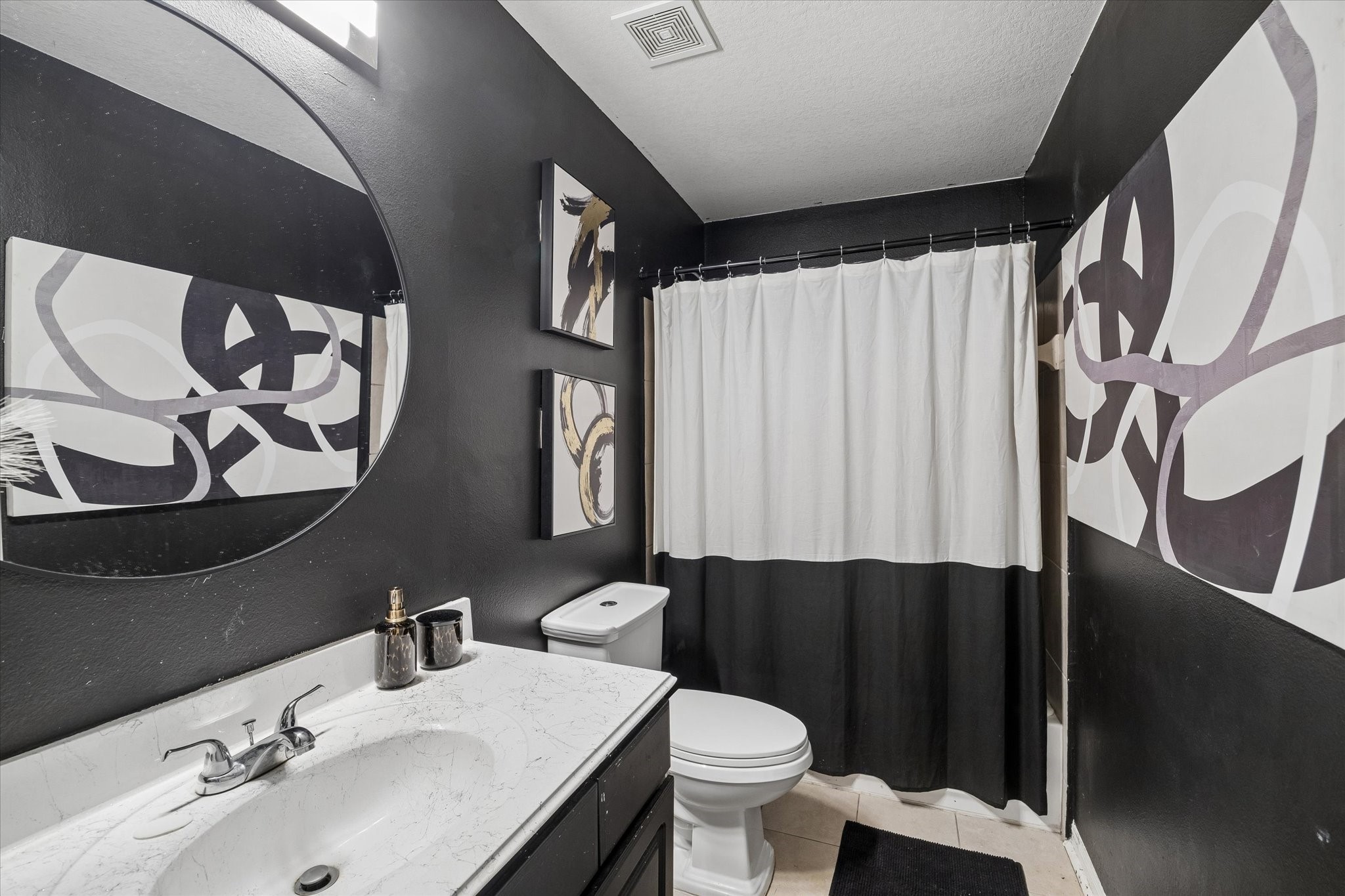 4830 Conifer Ridge Way Humble, TX 77346 - Photo 10 of 16 a bathroom with a sink vanity mirror and toilet