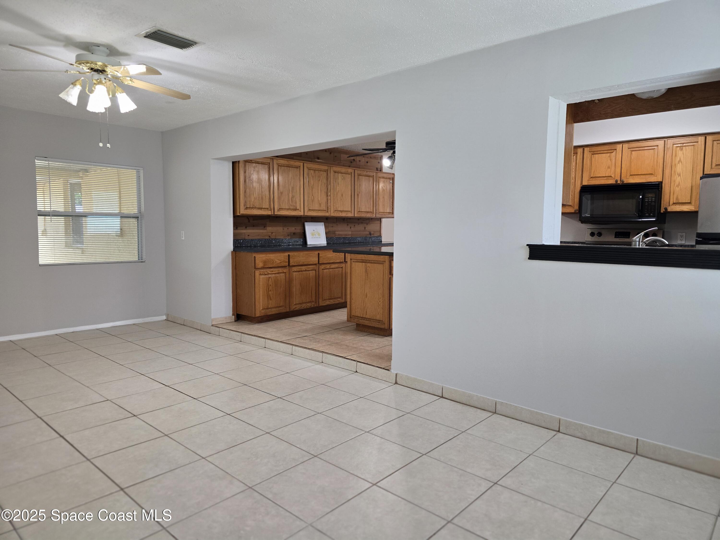 2872 Pennington Place Melbourne, FL 32935 - Photo 12 of 22 Family room