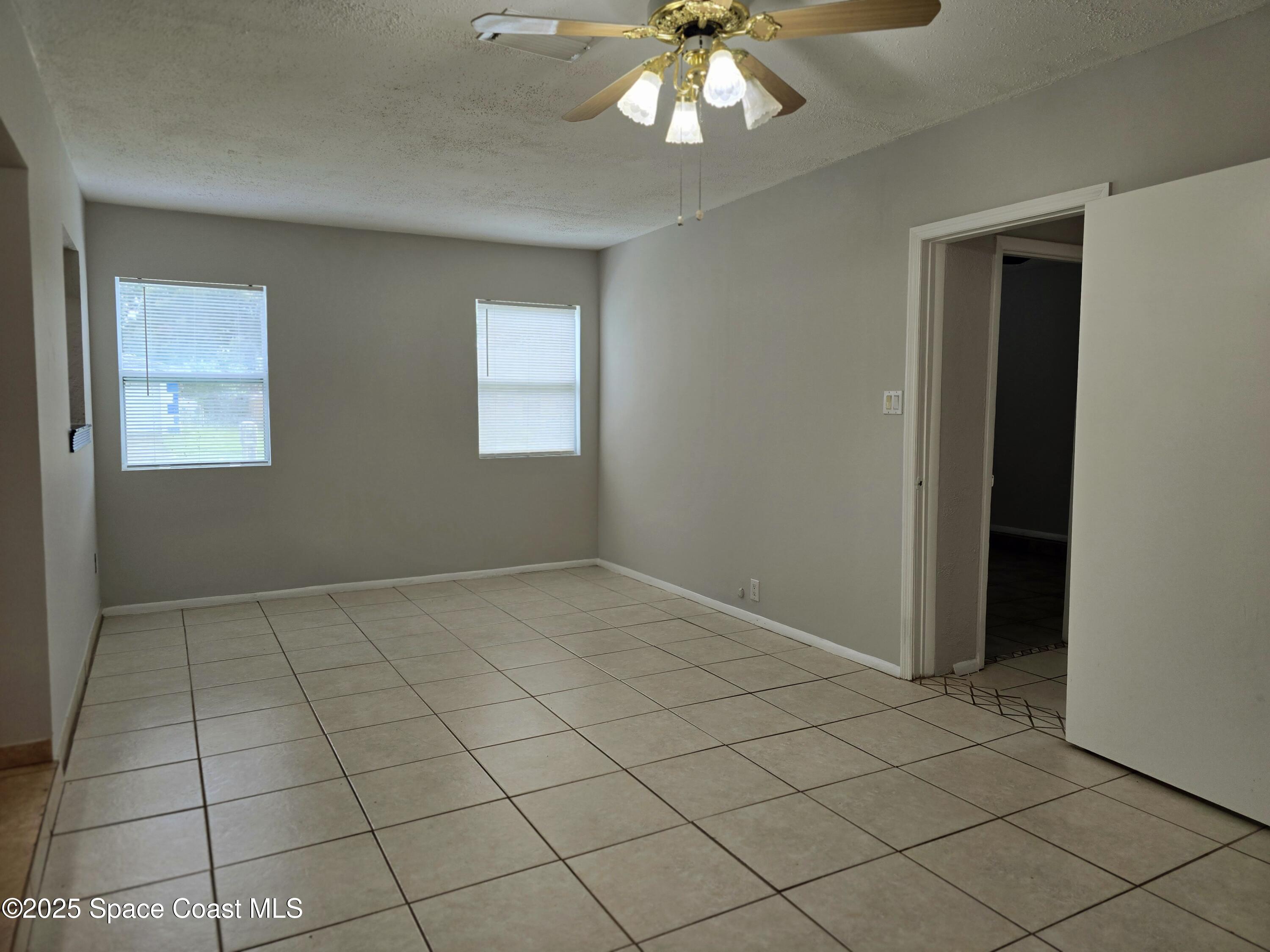 2872 Pennington Place Melbourne, FL 32935 - Photo 13 of 22 Family Room