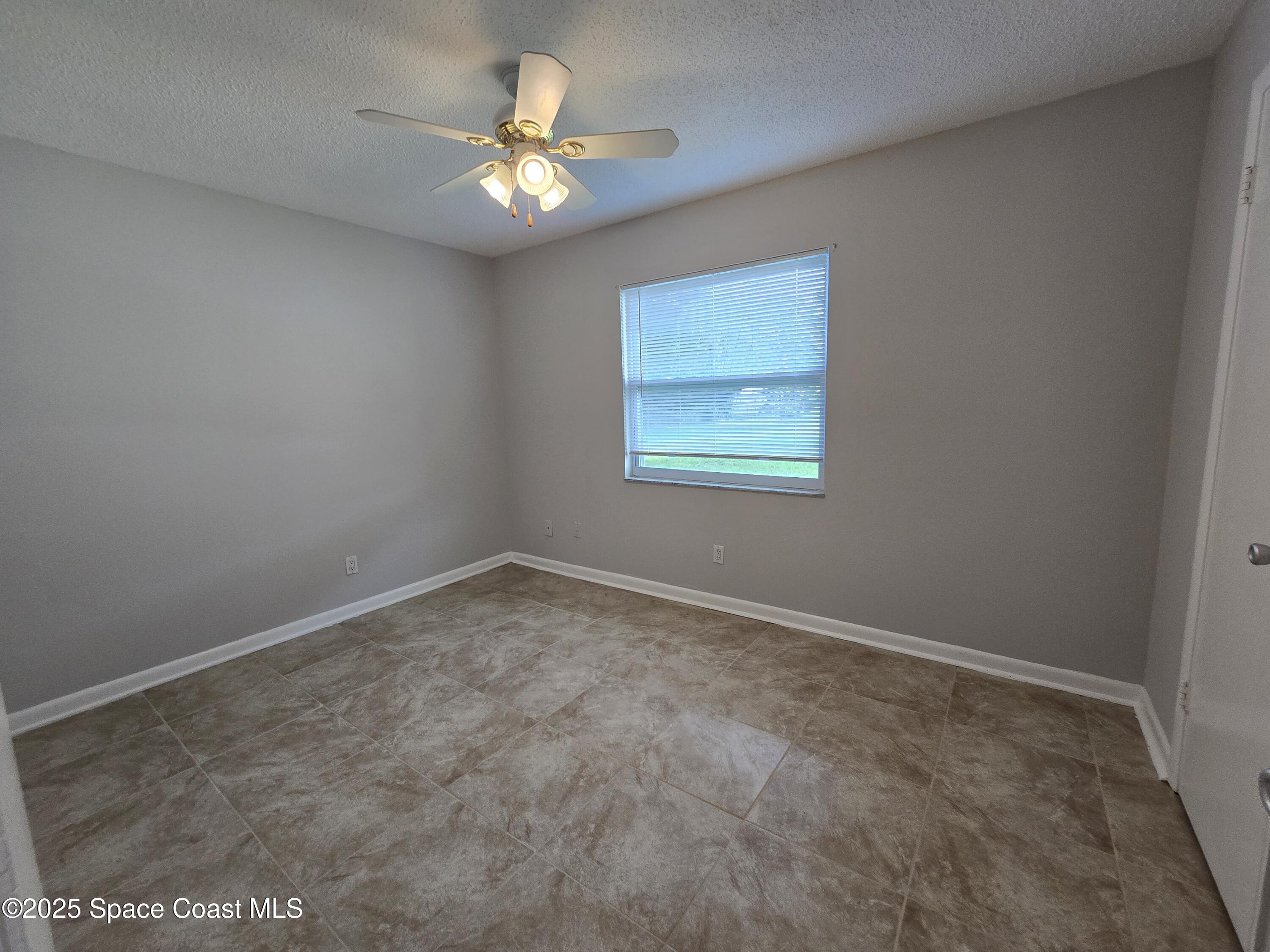 2872 Pennington Place Melbourne, FL 32935 - Photo 16 of 22 Bedroom 2