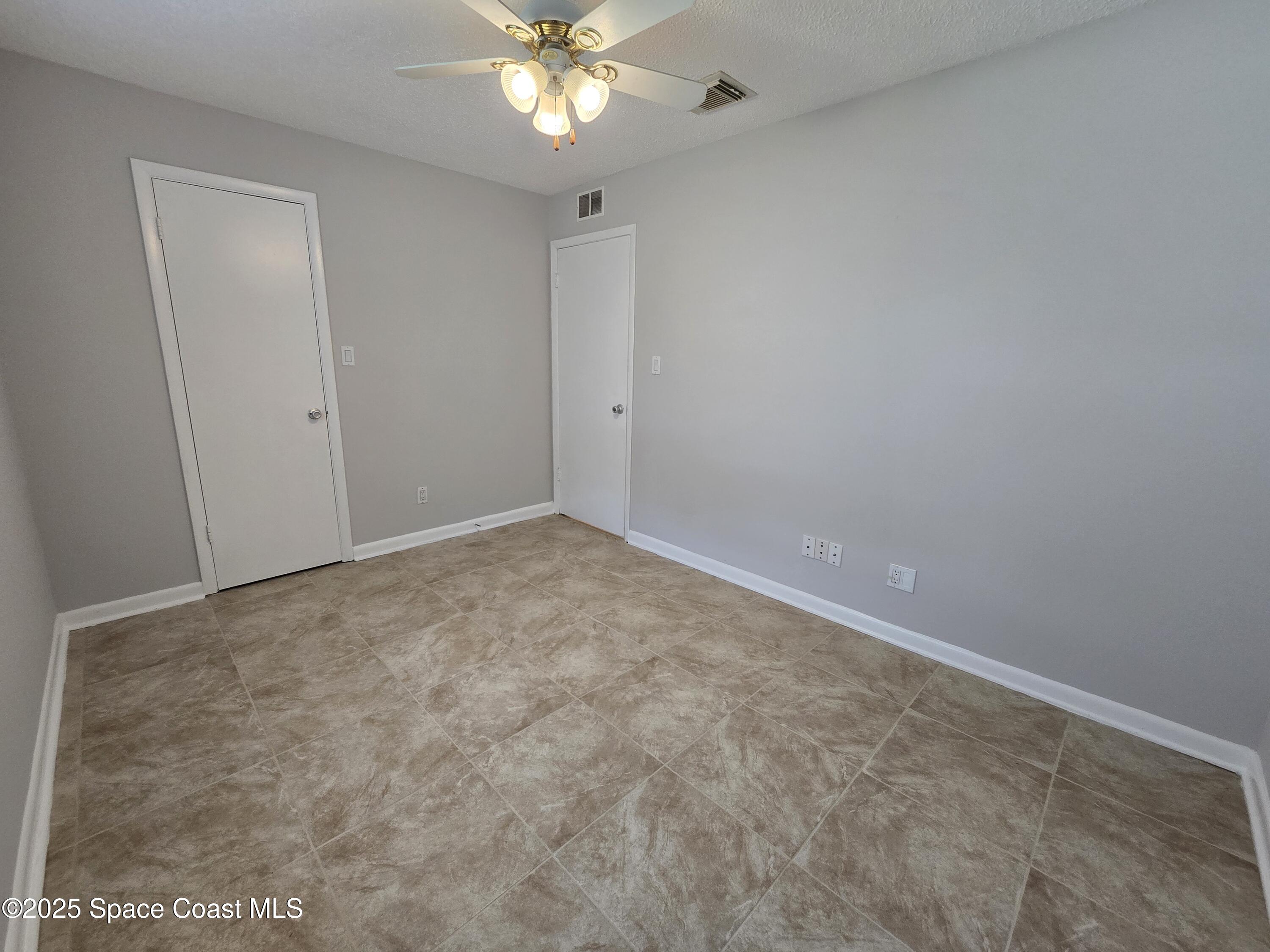 2872 Pennington Place Melbourne, FL 32935 - Photo 17 of 22 Bedroom 2