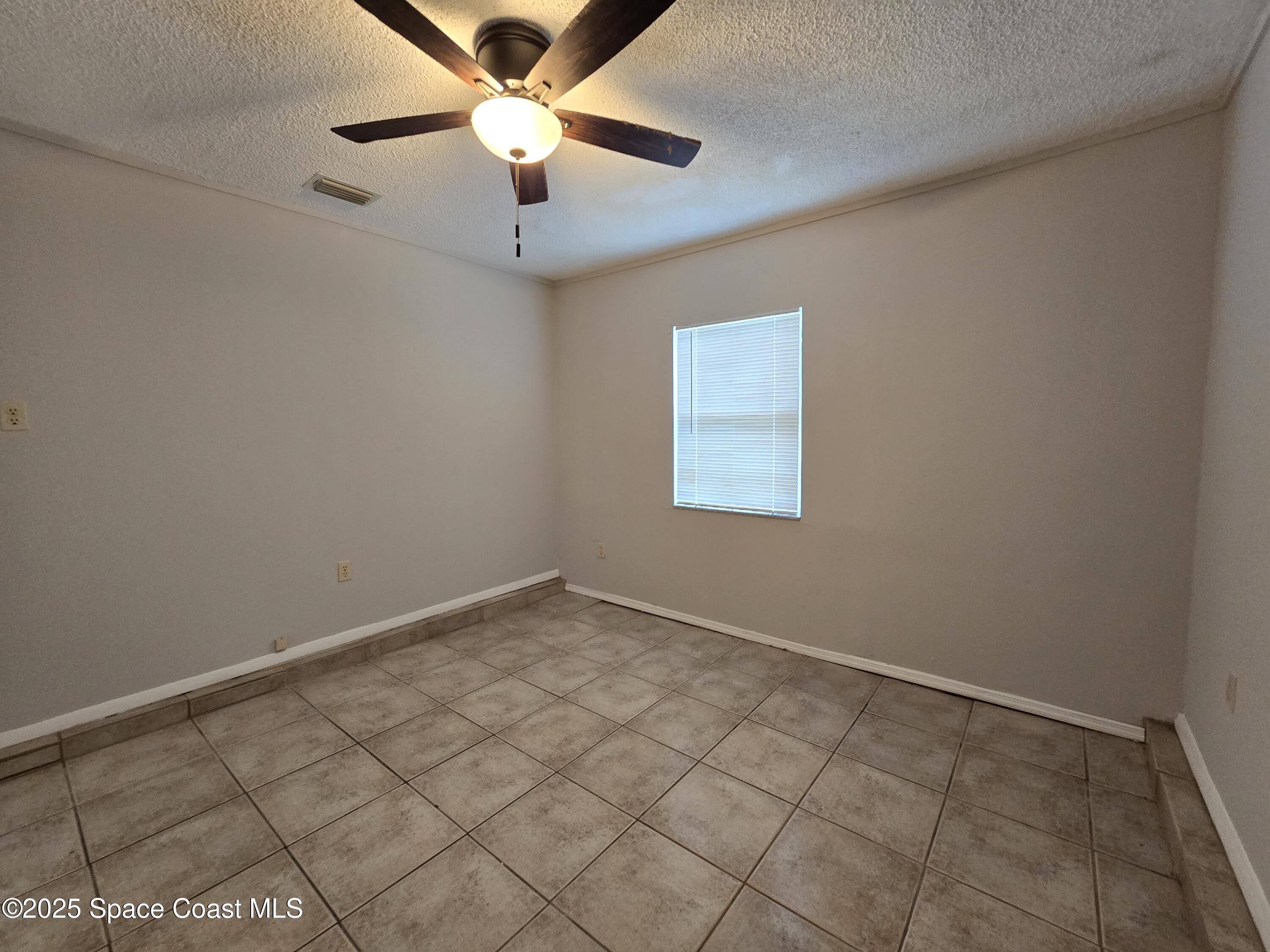 2872 Pennington Place Melbourne, FL 32935 - Photo 20 of 22 Bedroom 3