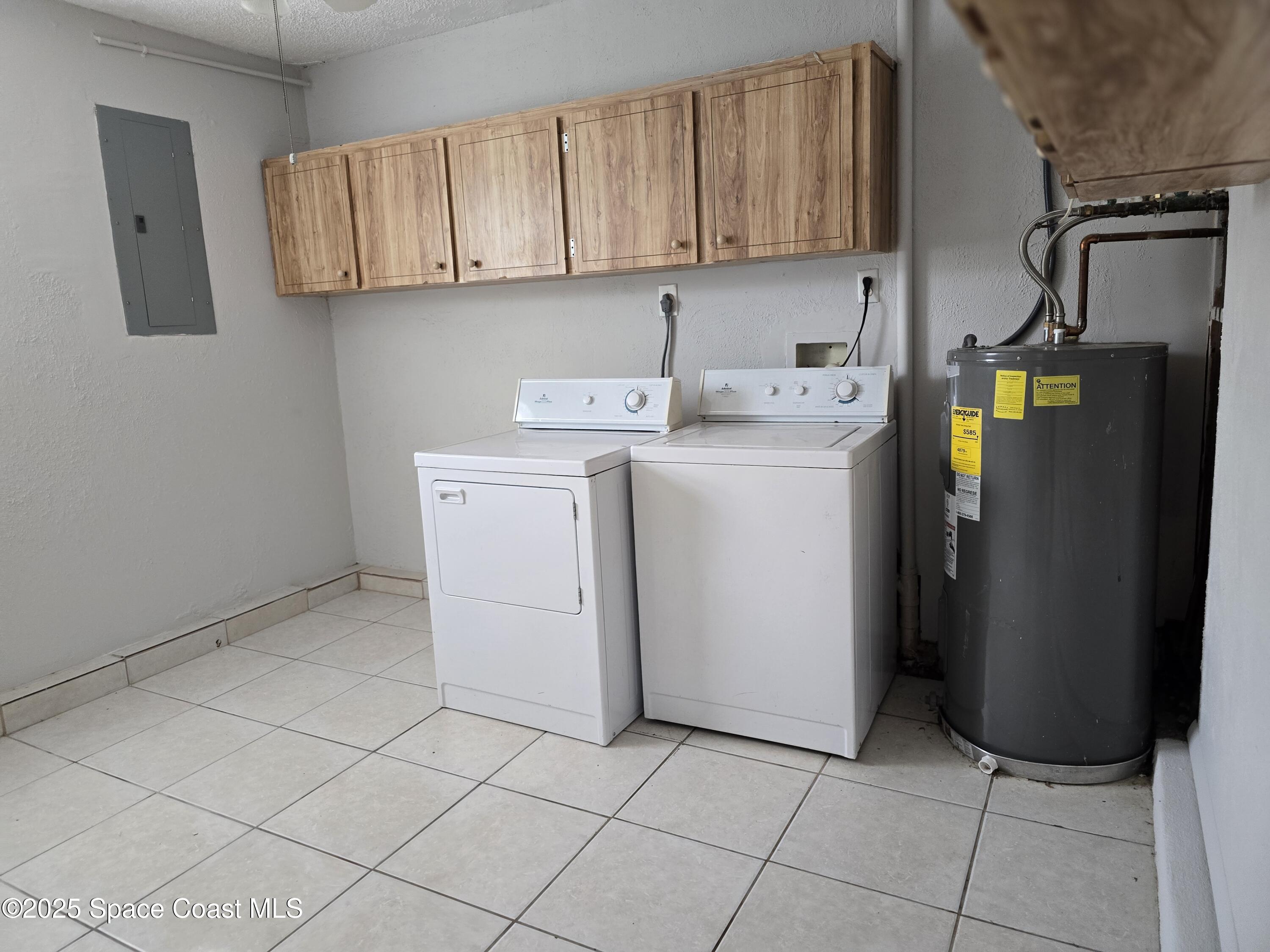 2872 Pennington Place Melbourne, FL 32935 - Photo 21 of 22 Laundry/ storage room