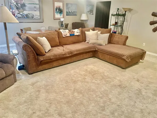 a living room with furniture and a couch