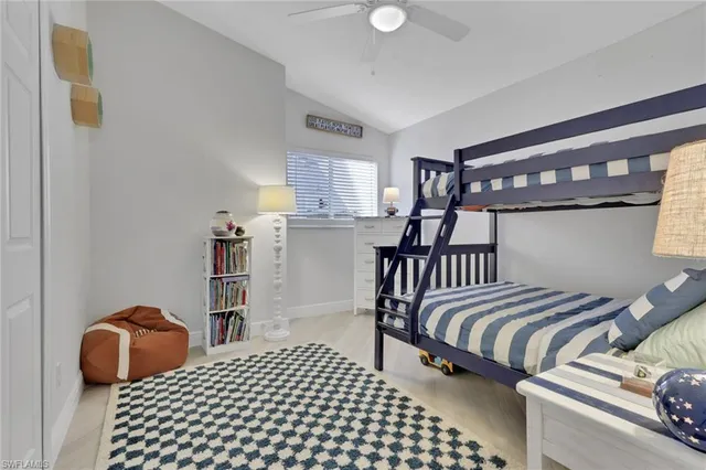 a bedroom with bed and balcony