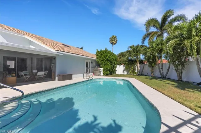 a view of a house with swimming pool