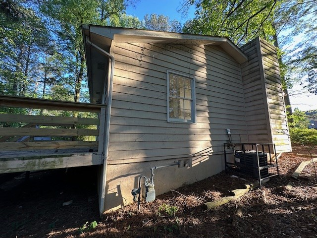 38 Bethesda Church Road Lawrenceville, GA 30044 - Photo 2 of 14 a view of a small house and a yard