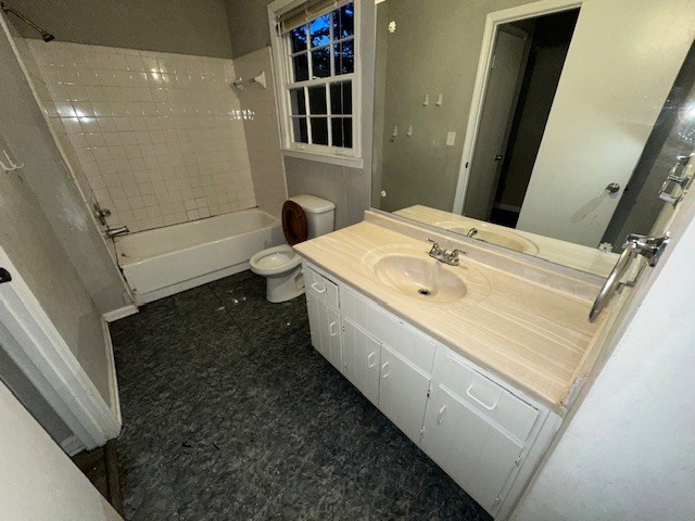 38 Bethesda Church Road Lawrenceville, GA 30044 - Photo 8 of 14 a bathroom with a sink a toilet and a mirror