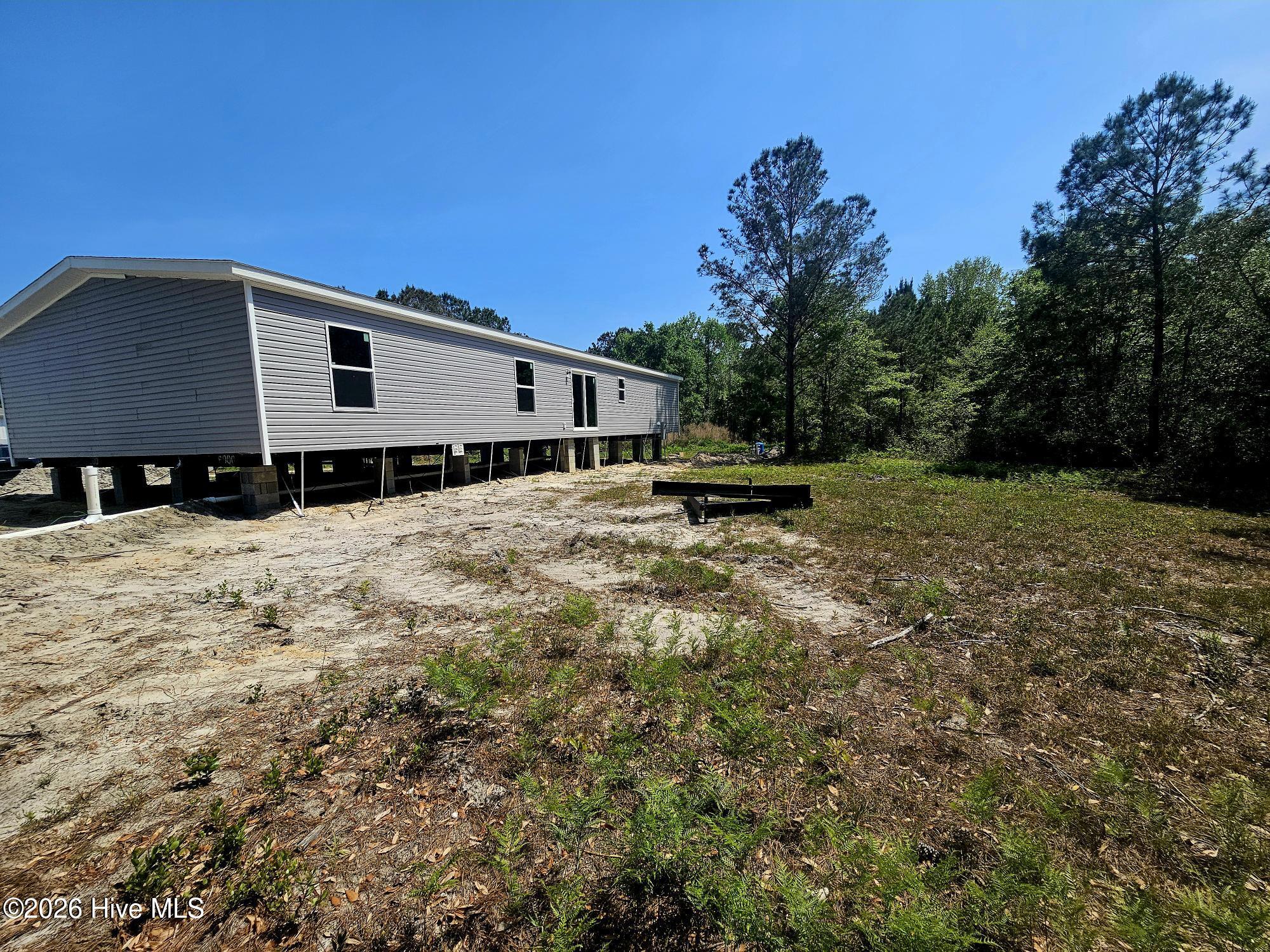 109 Mockingbird Lane Holly Ridge, NC 28445 - Photo 23 of 28 Back