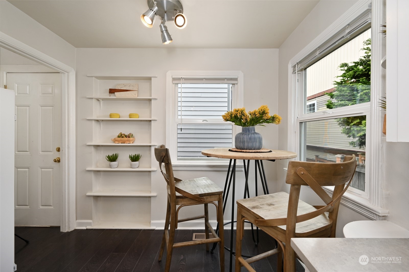 6037 Fauntleroy Way Southwest Seattle, WA 98136 - Photo 12 of 37 a dining room with furniture and window