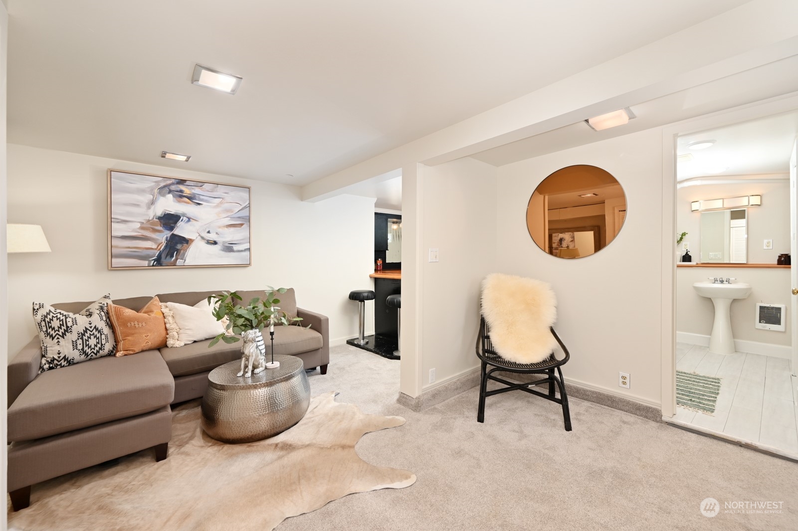 6037 Fauntleroy Way Southwest Seattle, WA 98136 - Photo 21 of 37 a living room with furniture and a chair