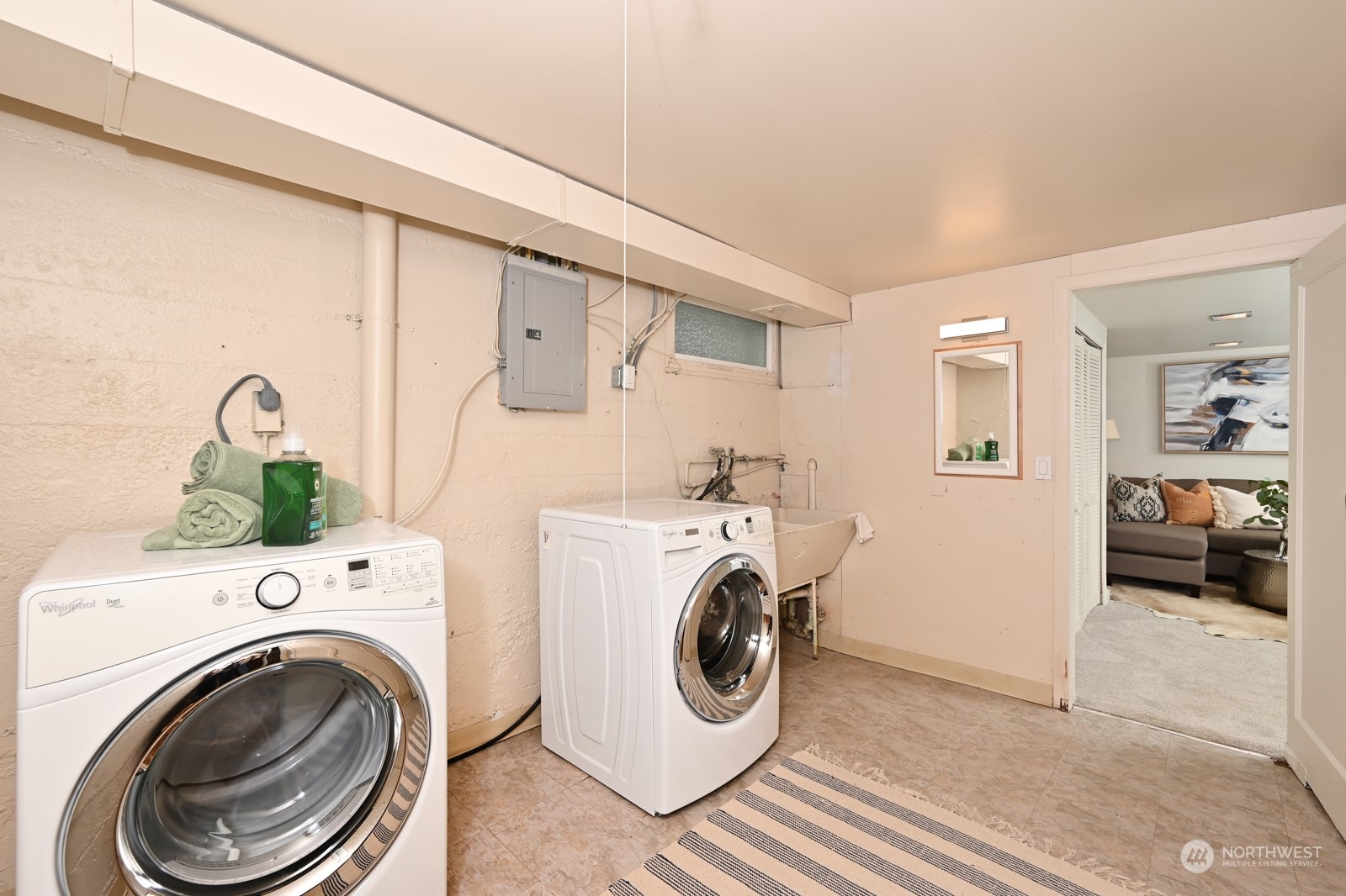 6037 Fauntleroy Way Southwest Seattle, WA 98136 - Photo 32 of 37 a utility room with dryer and washer